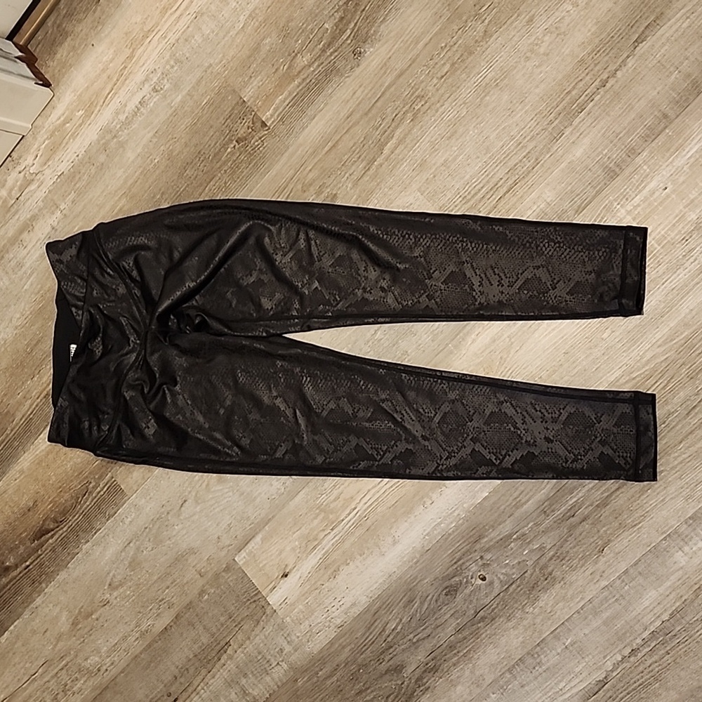 Sommer Ray black snake skin print leggings size medium inseam 30 inches.